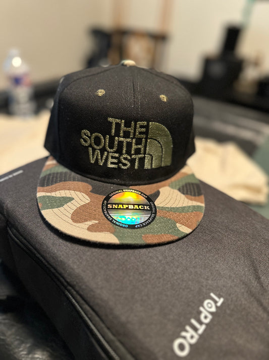 (A)THE SOUTH WEST – Camo Brim Snapback